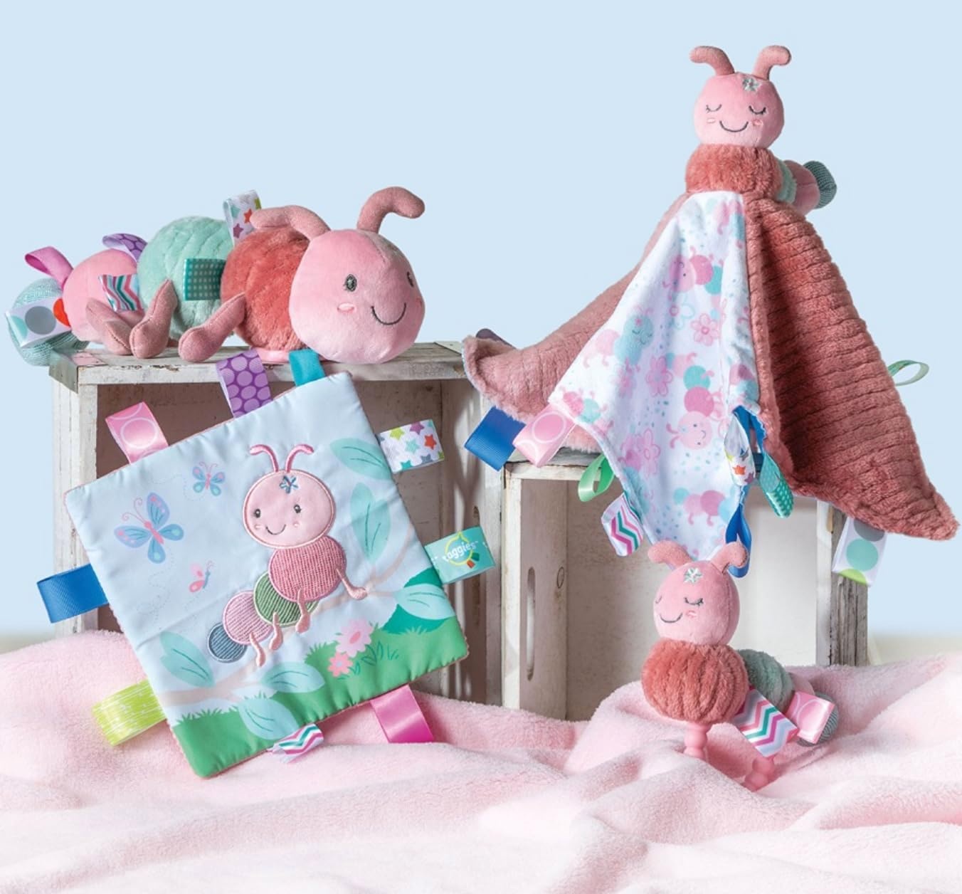 image:imageTaggies Crinkle Me Toy with Baby Paper amp Squeaker with Sensory Tags 65 x 65inches Camilla Caterpillar