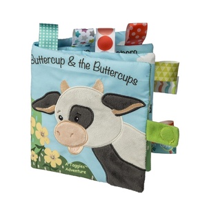 image:imageTaggies Soft Cloth Book with Crinkle Paper amp Squeaker and Sensory Tags 6 x 6Inches Buttercup Cow