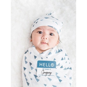 image:imageLulujo Baby Hello World Newborn Hat and Swaddle Blanket Set Hugs amp KissesBlue Triangle