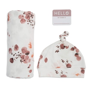 image:imageLulujo Baby Hello World Newborn Hat and Swaddle Blanket Set Hugs amp KissesEucalyptus