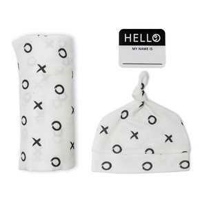 image:imageLulujo Baby Hello World Newborn Hat and Swaddle Blanket Set Hugs amp KissesHugs  Kisses