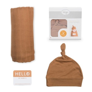 image:imageLulujo Baby Hello World Newborn Hat and Swaddle Blanket Set Hugs amp KissesTan